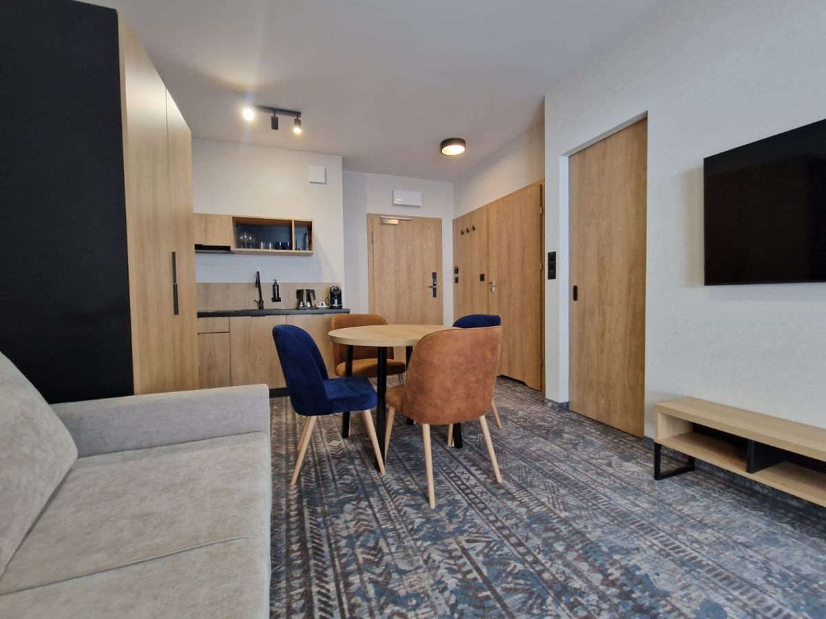 Apartament z miejscem w garażu i balkonem